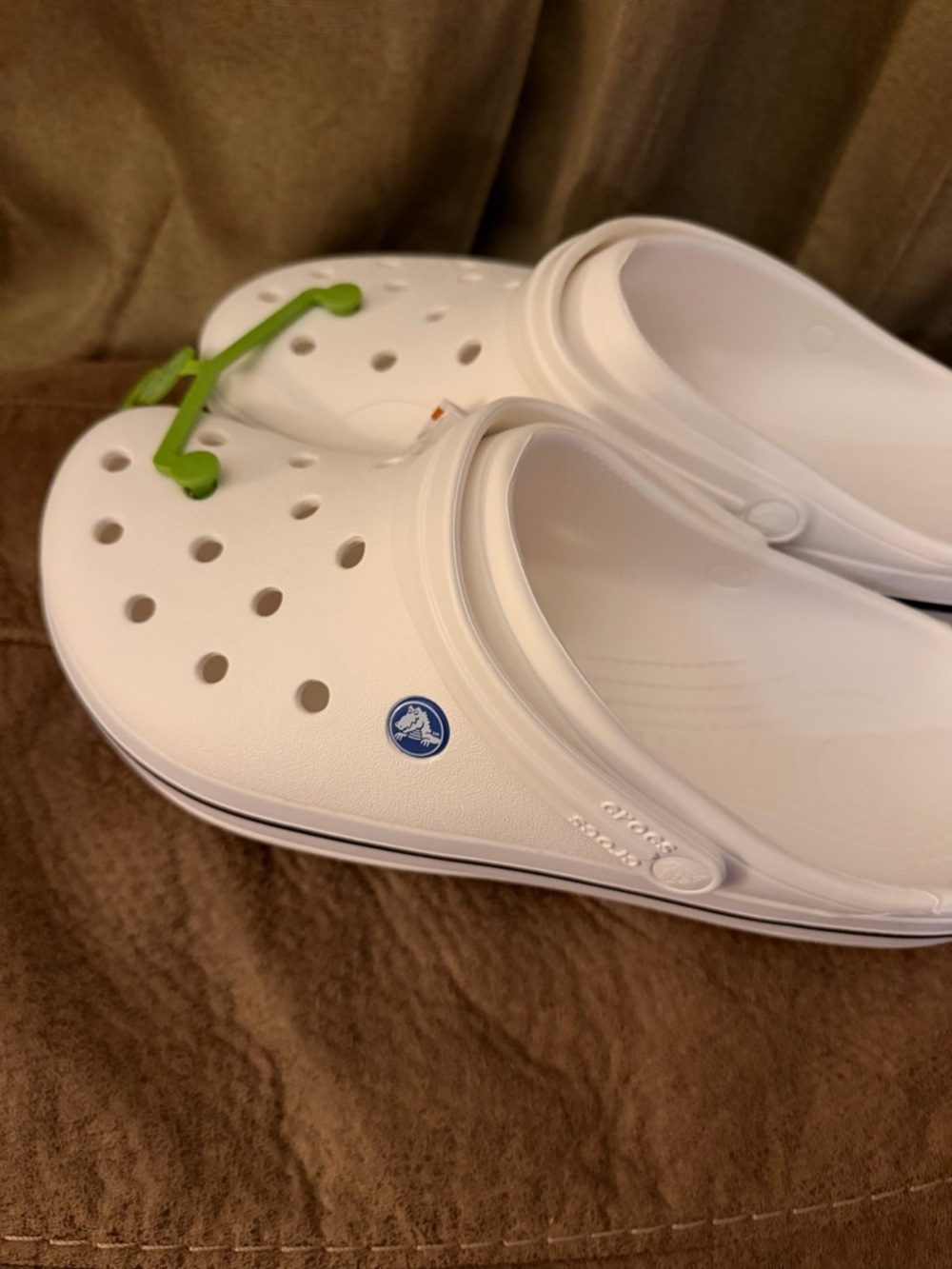 CROCS White Clogs with Green Accent